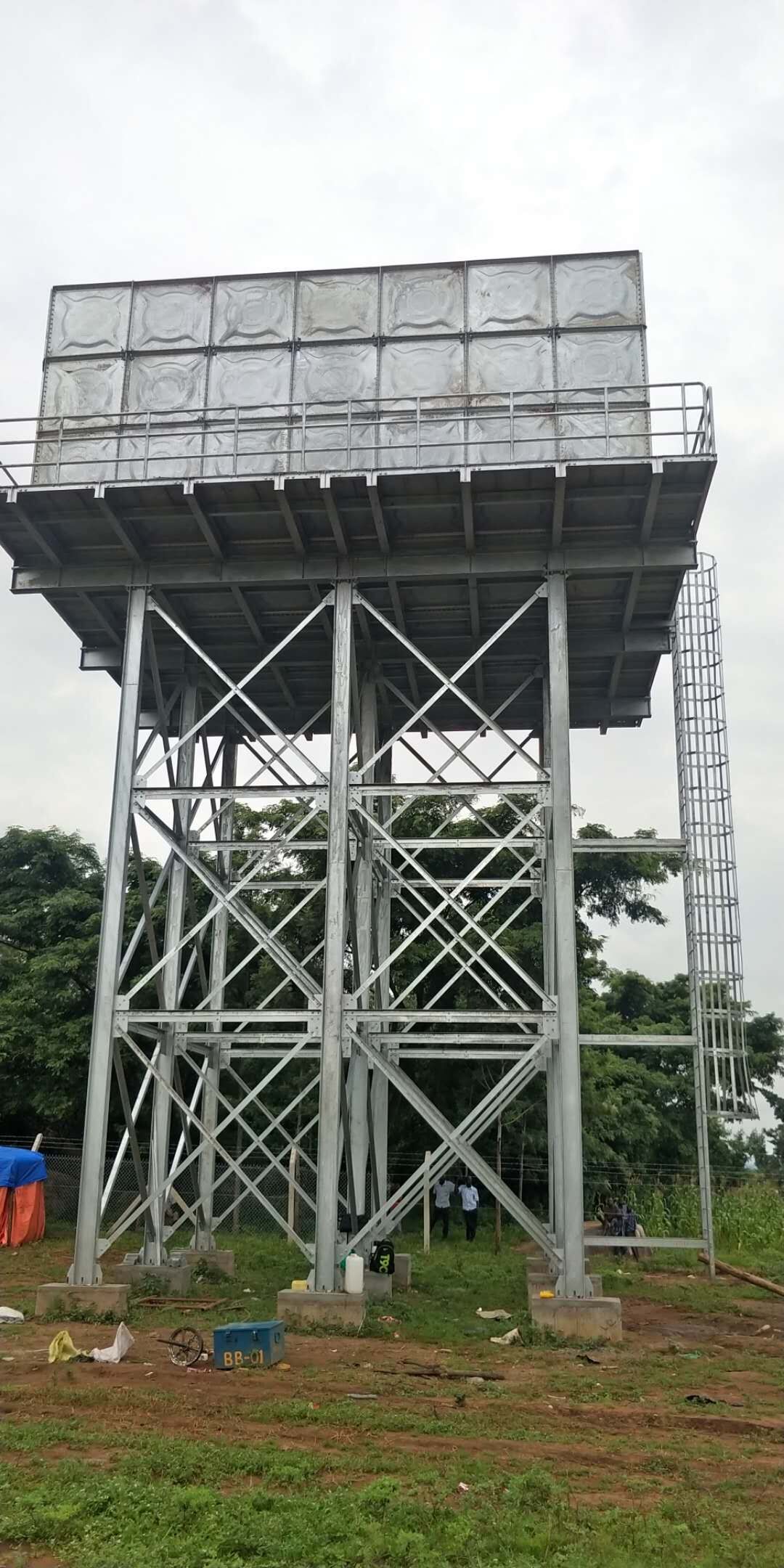 Fiberglass water tank and galvanized steel tower